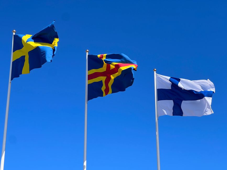 The flags of Sweden, Åland, and Finland.