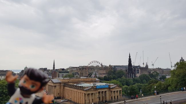 The Scottish National Gallery, the obligatory Ferris wheel, and the Scott Monument when descending from Castle Hill