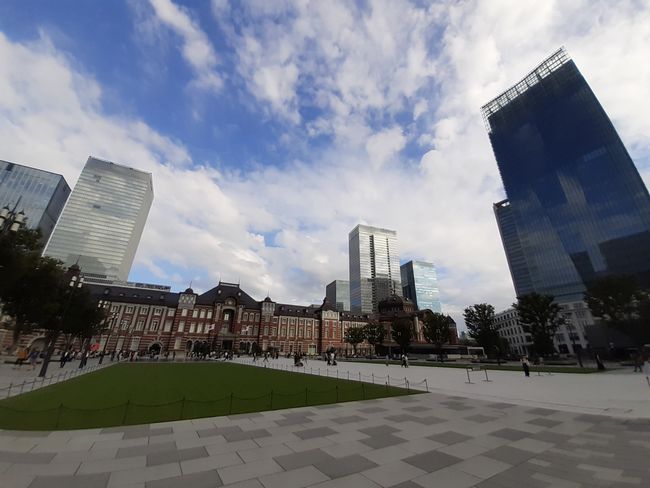 the Tokyo Station surrounded by skyscrapers