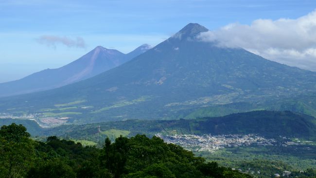 Climbing Pacaya - View of Fuego (Visible the lava flow that killed over 160 people in early June 18), Acatenango, and Agua