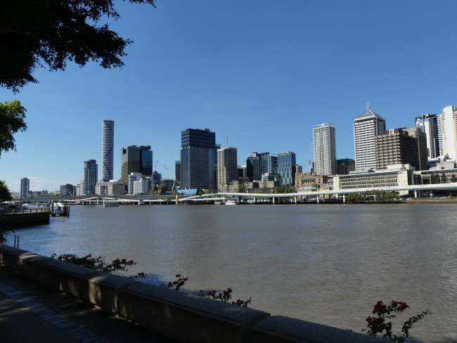 Walk on the riverside promenade with a view of the CBD
