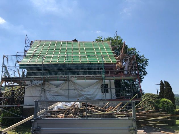 Old roof removed, new roof installed...