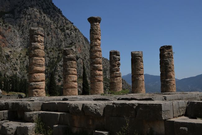 The columns of the temple against an impressive backdrop