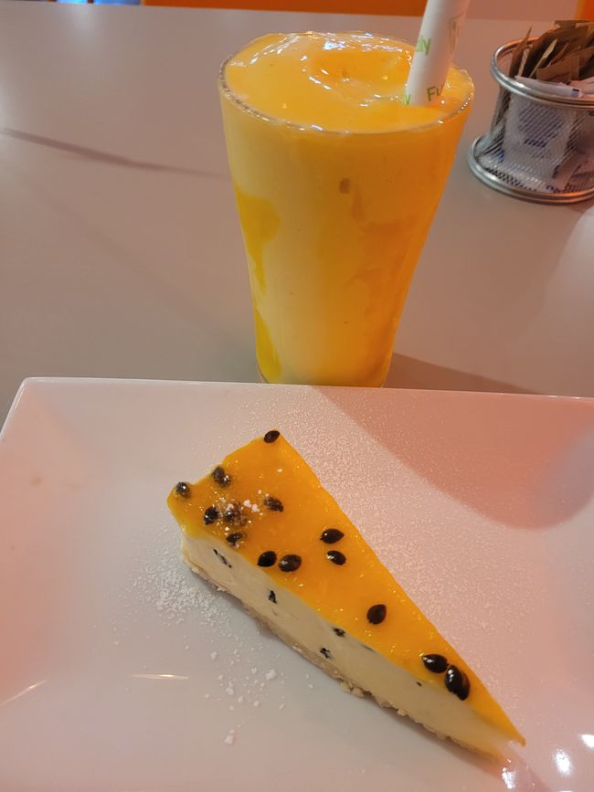 Passionfruit cheesecake with  mango smoothie 