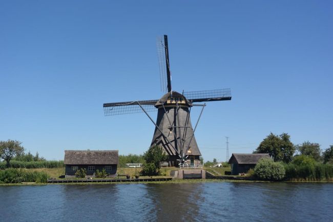 Holland: through the town of Gouda, and past many windmills.