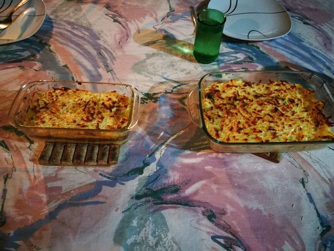 On the last evening at Noemy's, we were allowed to make a special request for dinner: Paddy asked for the same meal as the day before, mashed cooking banana layered with beans and baked. Janina asked for yucca casserole with vegetables.
