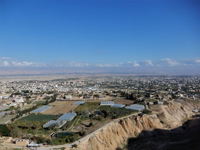 View from above of Jericho. The mountain range in the background is already Jordanian territory