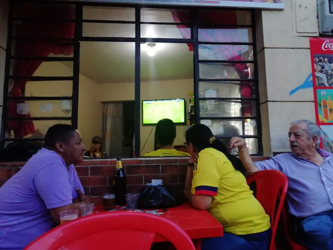 We watched the game in a small corner pub together with locals who, when they spotted us in Colombian T-shirts, gave us a shot of joy.