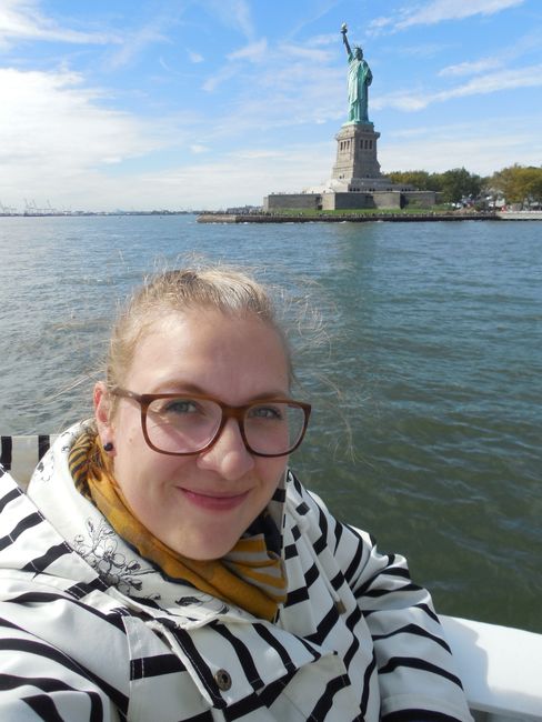 In front of the Statue of Liberty