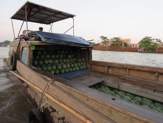 Watermelon boat at the floating market of Can Tho