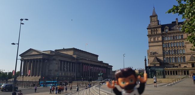 The St George's Hall Liverpool on the left and the Liverpool Empire Theatre on the right