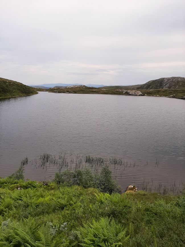 Lake under moving clouds