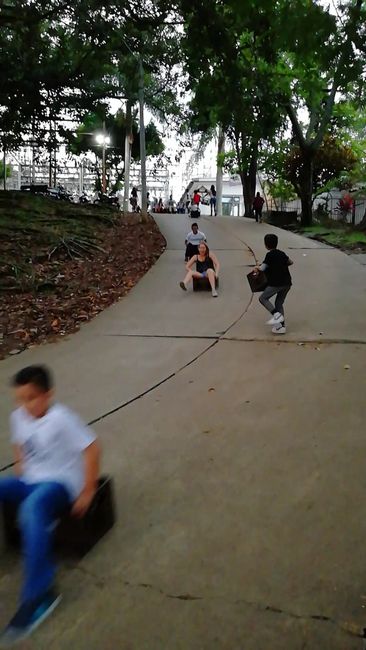 On Sunday, after the mass, children slide down a small hill next to the church on beverage crates. Ten minutes cost about 50 cents. Of course, we wanted to try that too.