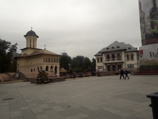 Main square with the theater and Biserica 'Sfântul Ioan Botezătorul'