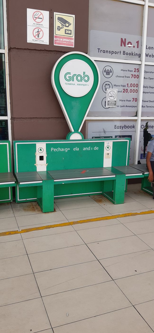 The grave delivery service/taxi service is quite widespread in Malaysia. Another competing app was blocked by the government. There is a bank with power outlets at the bus station - very practical.