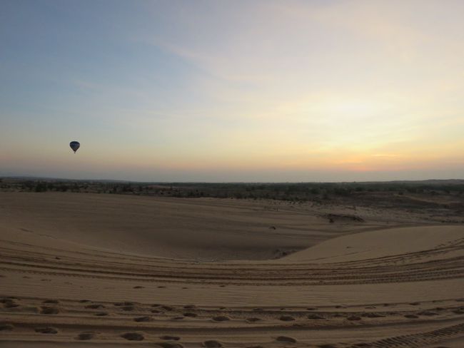 Hot air balloon over the white sand dunes of Mui Ne