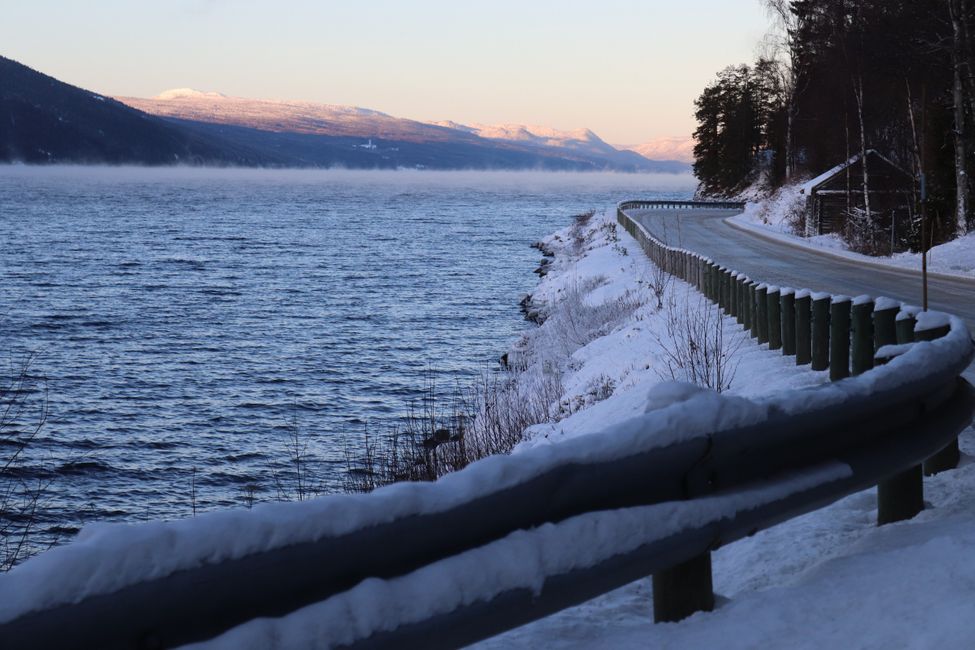 The lake Storsjøen rises into the cold air
