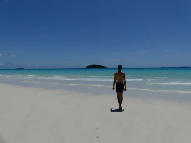 The vastness of the white sand and blue water