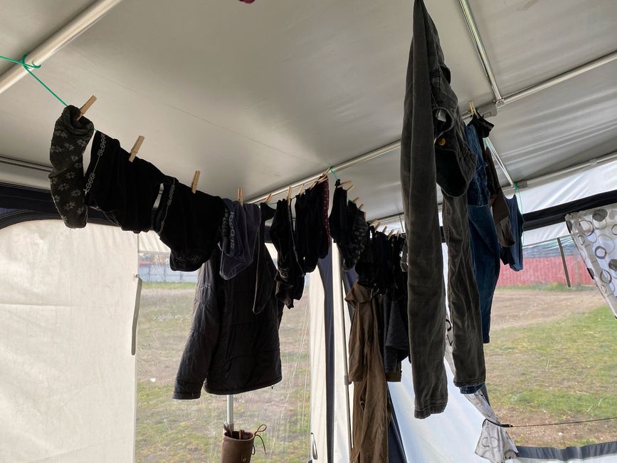 Drying clothes in the awning when it's raining
