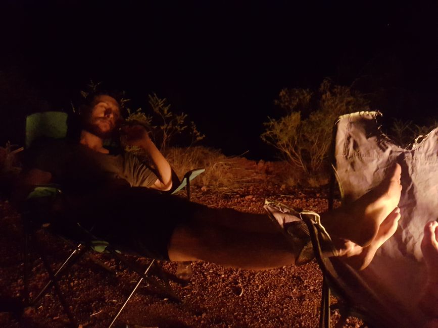 A satisfied birthday boy by the campfire