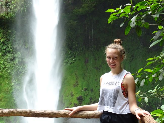 Joice in front of the waterfall