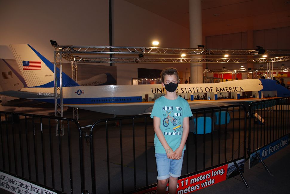 In front of the giant Lego plane