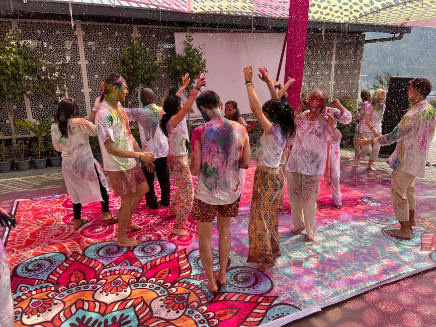 Dancing here under the colorful shower. 