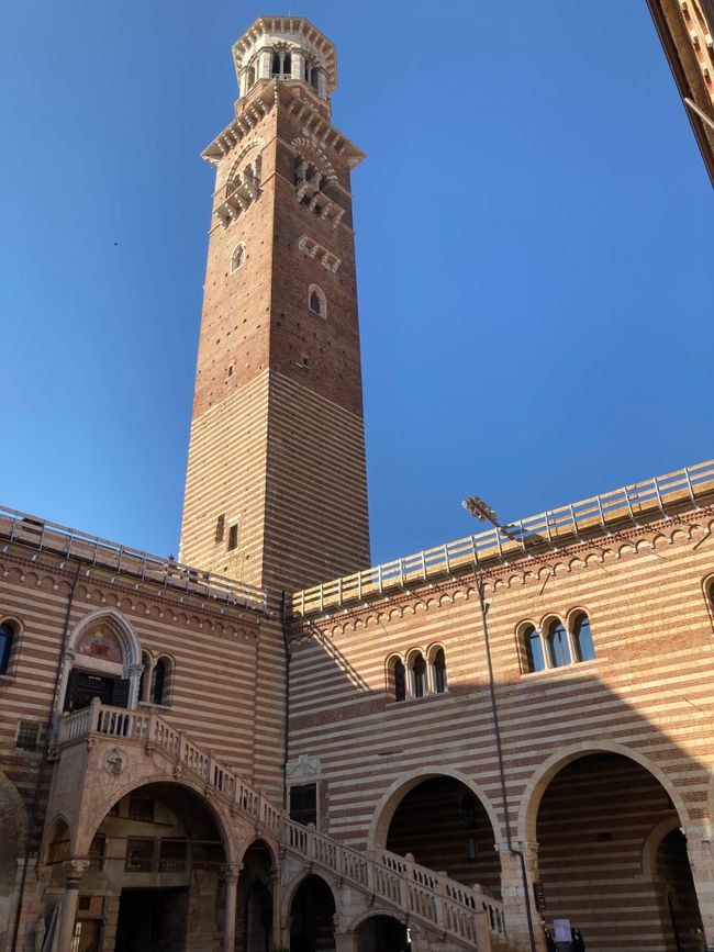 view of Torre dei Lamberti from Cortile del Mercato Vecchio