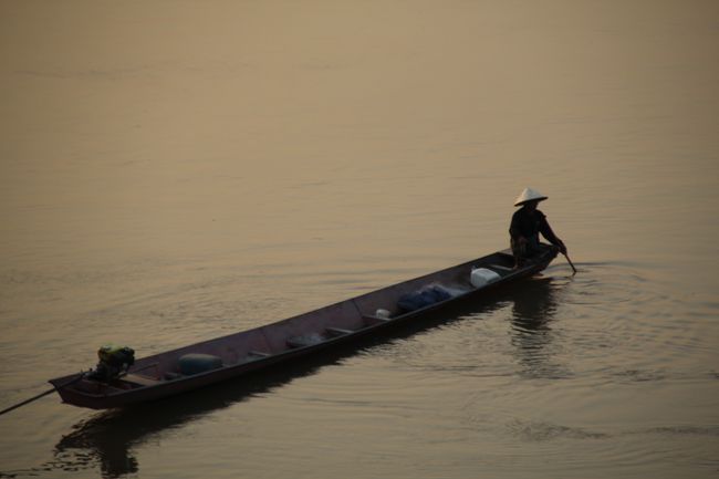 Fisherman on a longboat
