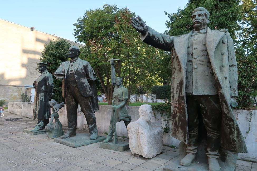 Statues of communism. Lenin, the worker, Albanian dictator Hoxha, and Stalin (from left to right).