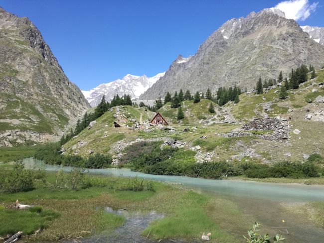 Glacier stream in front of a mountain hut
