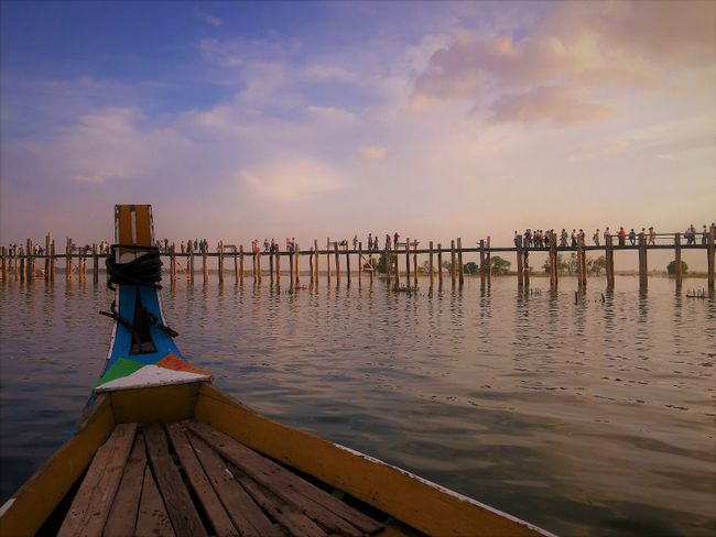 The small wooden boat: A great spot to observe the U-Bein Bridge