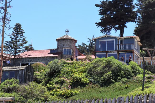 A beautiful house with turrets, stretching along like Chile along the Pacific