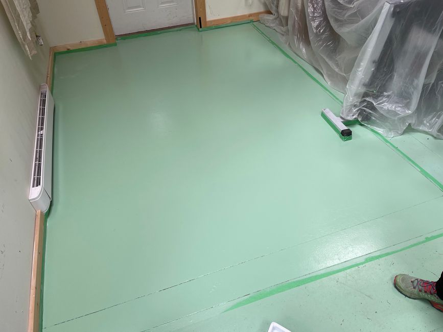 Painting the floor (one of our tasks here)