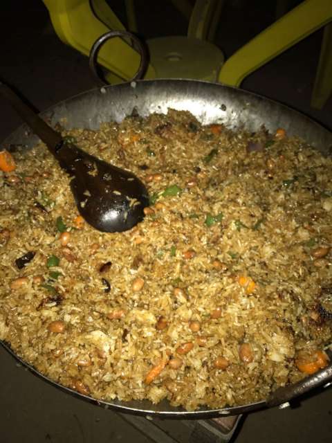 Pilau: Rice dish with vegetables, onions, garlic, chili, and spices