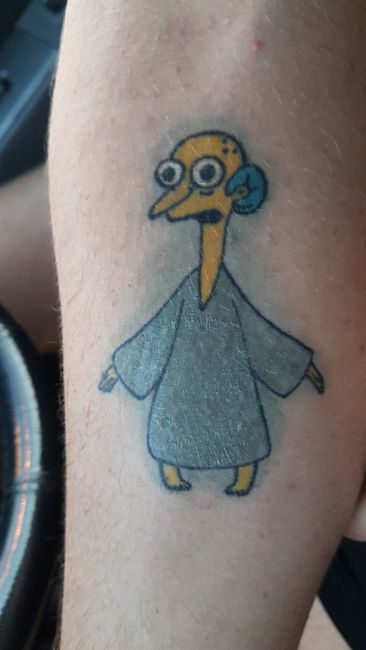 Our host's tattoo in Darwin. Mr. Burns from The Simpsons. 