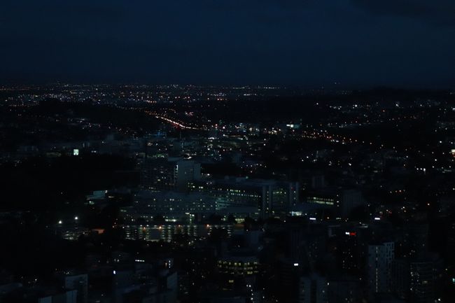 Auckland bei Nacht von Sky Tower aus